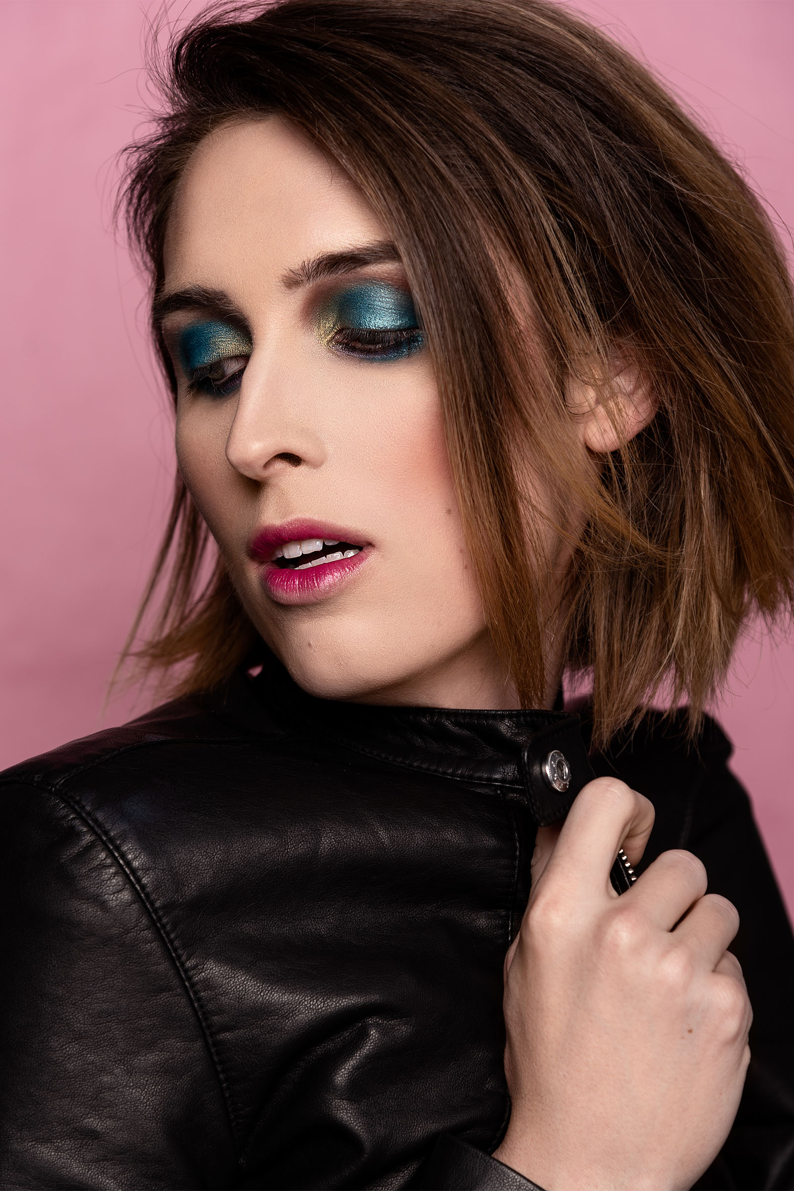 Female model beauty shot with shoulder-length hair and turquoise eyeshadow by Utah photographer Christopher Loke